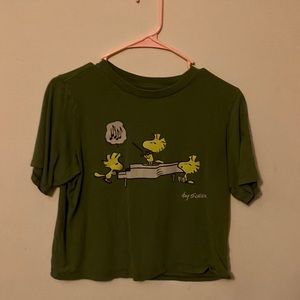 Brand Uniqlo medium green color cotton with Woodstock from peanuts on it